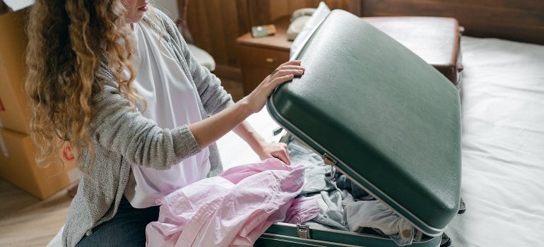 a woman and a suitcase