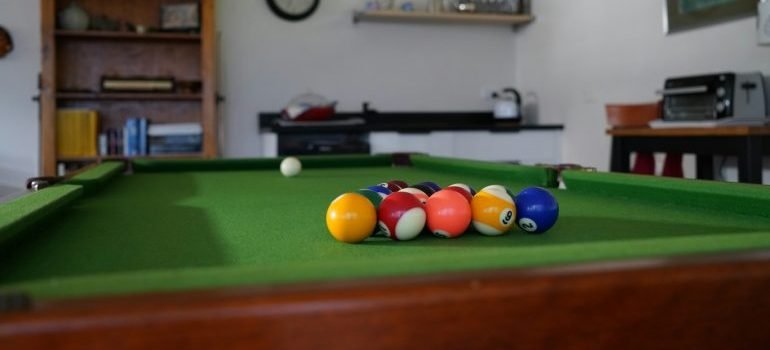 you should never move a pool table alone