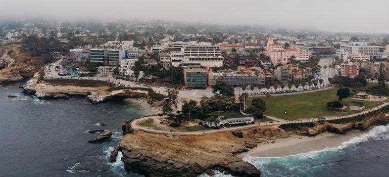 Aerial Photography of Buildings Beside of Sea