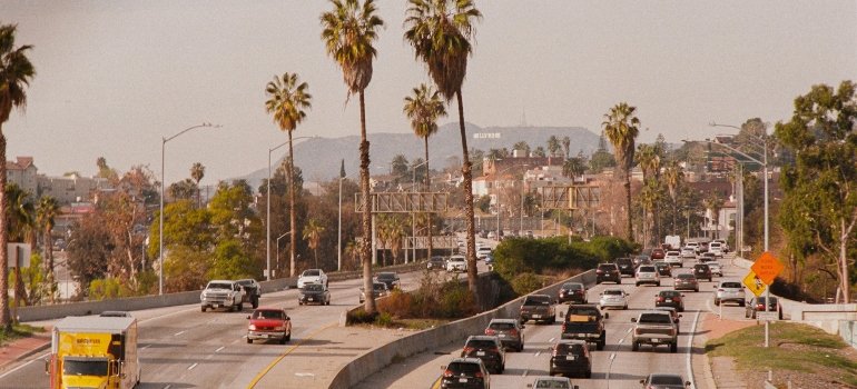 Cars on the road near busy streets, showing the traffic conditions West Hollywood Movers like Father & Son Moving & Storage navigate daily.