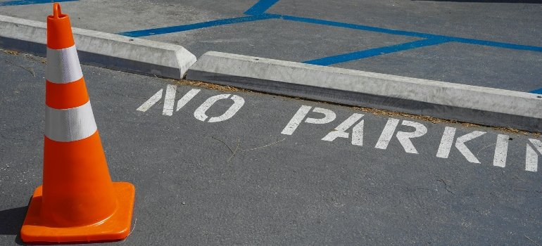 Cone by No Parking Horizontal Sign