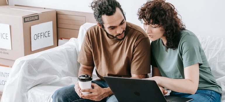 Couple Using A Laptop Computer