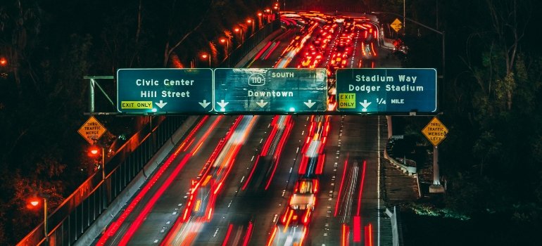 Long exposure photography of vehicles on road, capturing motion and busy traffic often managed by Studio City movers during relocations.
