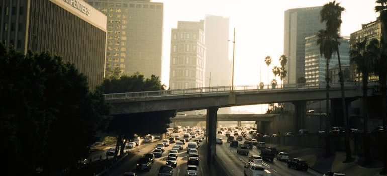 Cars on Road Near Bridge