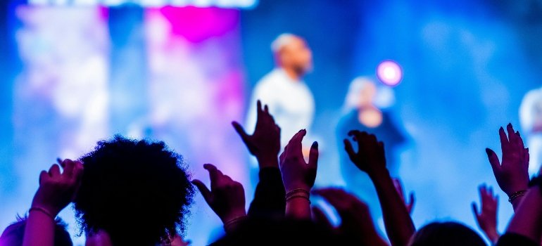 Vibrant Concert Crowd with Stage Lights