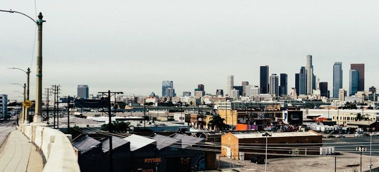 City Buildings Under White Clouds