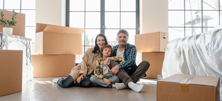 a family settling into their new home after relocating with movers Sylmar