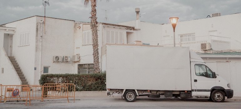 Moving truck parked on a residential street in Beverly Hills with proper parking permits