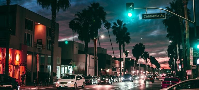 Busy city street in tropical town at night