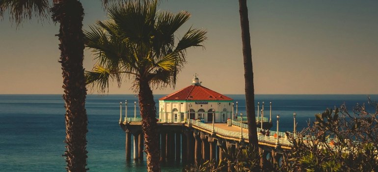 Brown wooden house near the shoreline, a common sight in areas served by experienced Manhattan Beach movers.