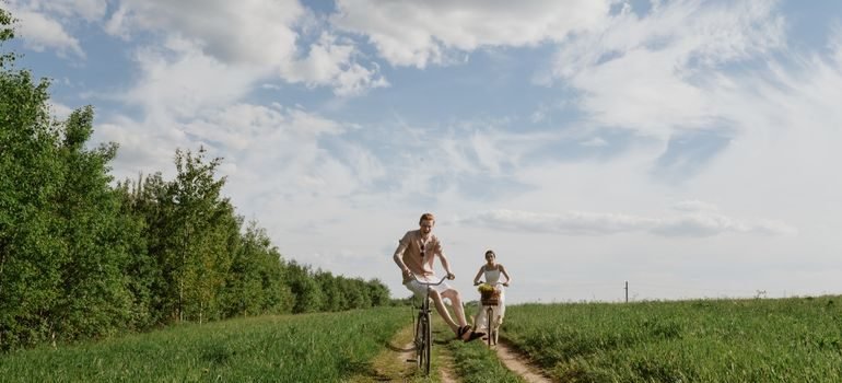 Two people cycling