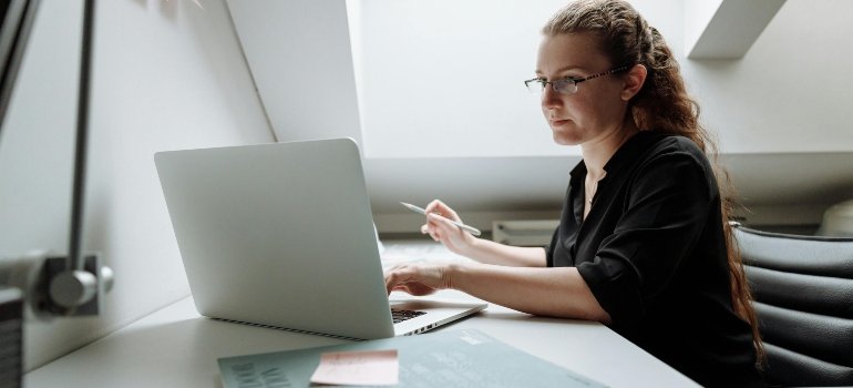 Close-up Photo of Female using Laptop
