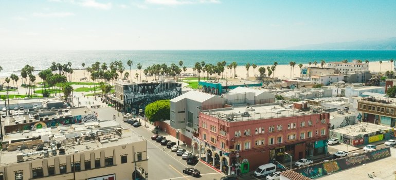 Aerial view of concrete buildings near the ocean